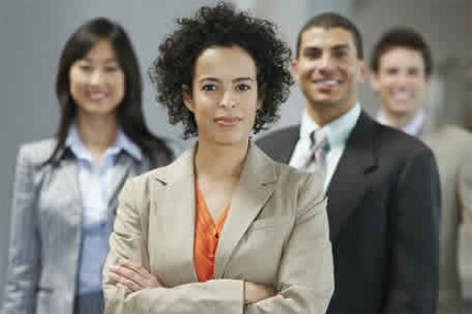 four business people looking confident